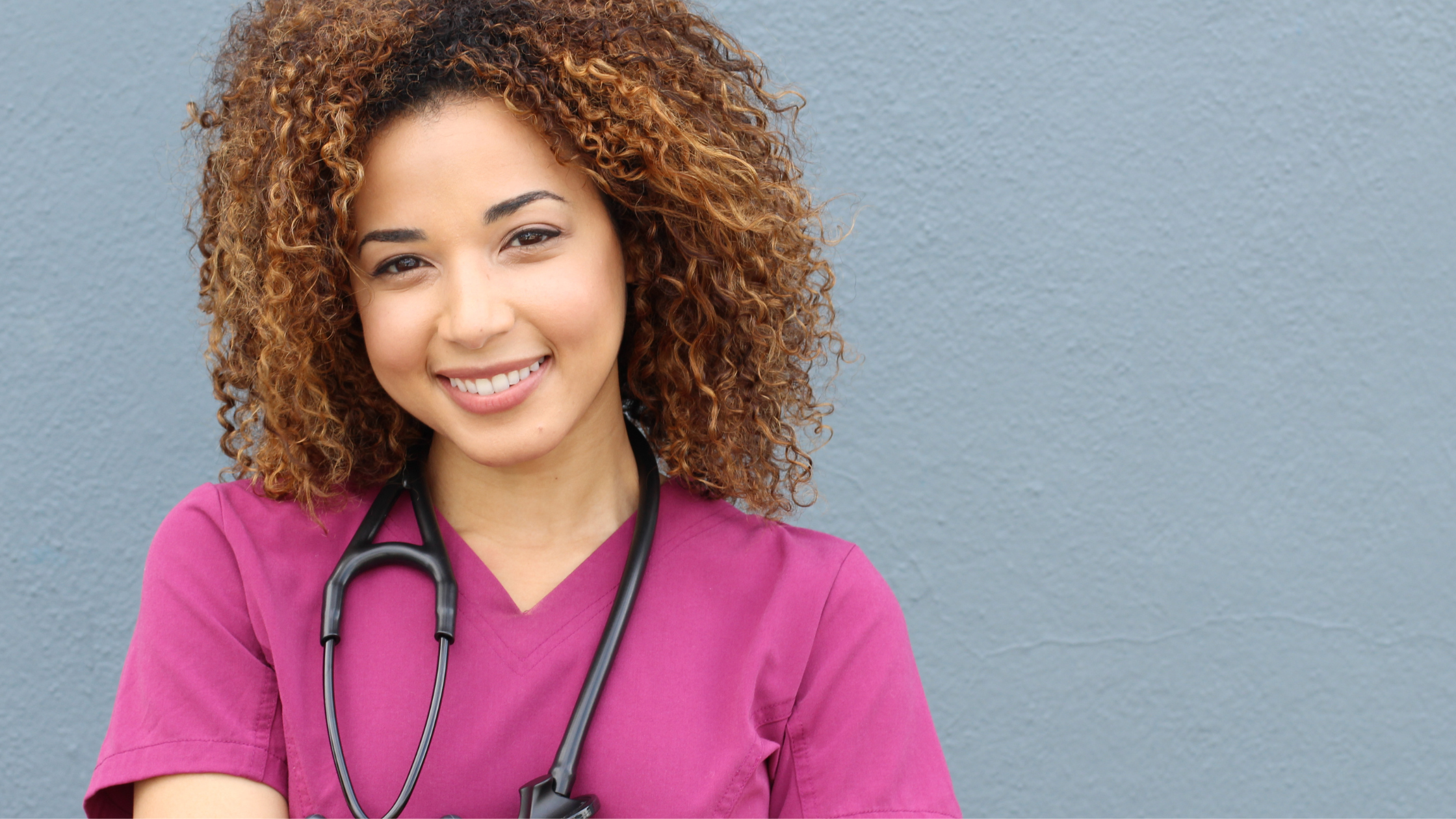 nurse with pink scrubs